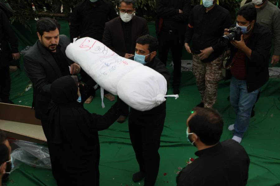 آیین تشییع و تدفین پیکر پاک شهید گمنام در پردیس شهید چمران به روایت تصویر
 20