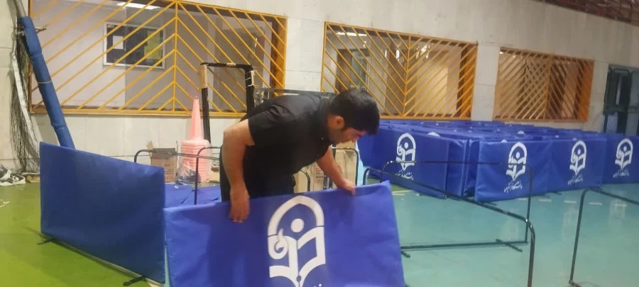 آماده سازی فضای سالن ورزشی برای ارزیابی از داوطلبان رشته تربیت بدن 3